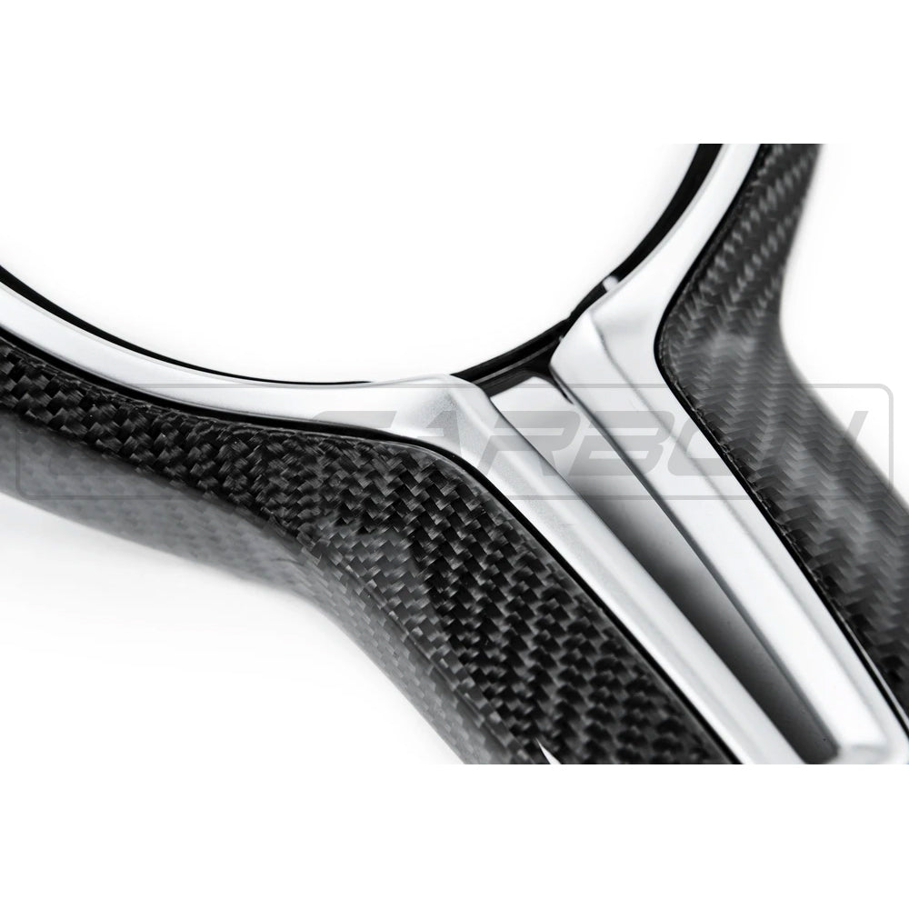 BMW Fxx M CAR CARBON FIBRE STEERING WHEEL TRIM-Accessories-CT CARBON-CT Carbon - High-quality carbon fiber and gloss black aerodynamic parts for premium sports and luxury vehicles.