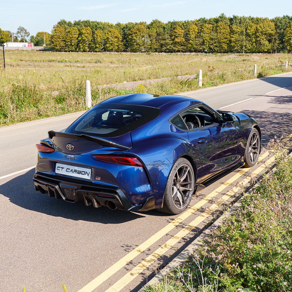 TOYOTA SUPRA 2019+ A90 CARBON FIBRE DIFFUSER ADD ON-Diffuser-CT CARBON-CT Carbon - High-quality carbon fiber and gloss black aerodynamic parts for premium sports and luxury vehicles.