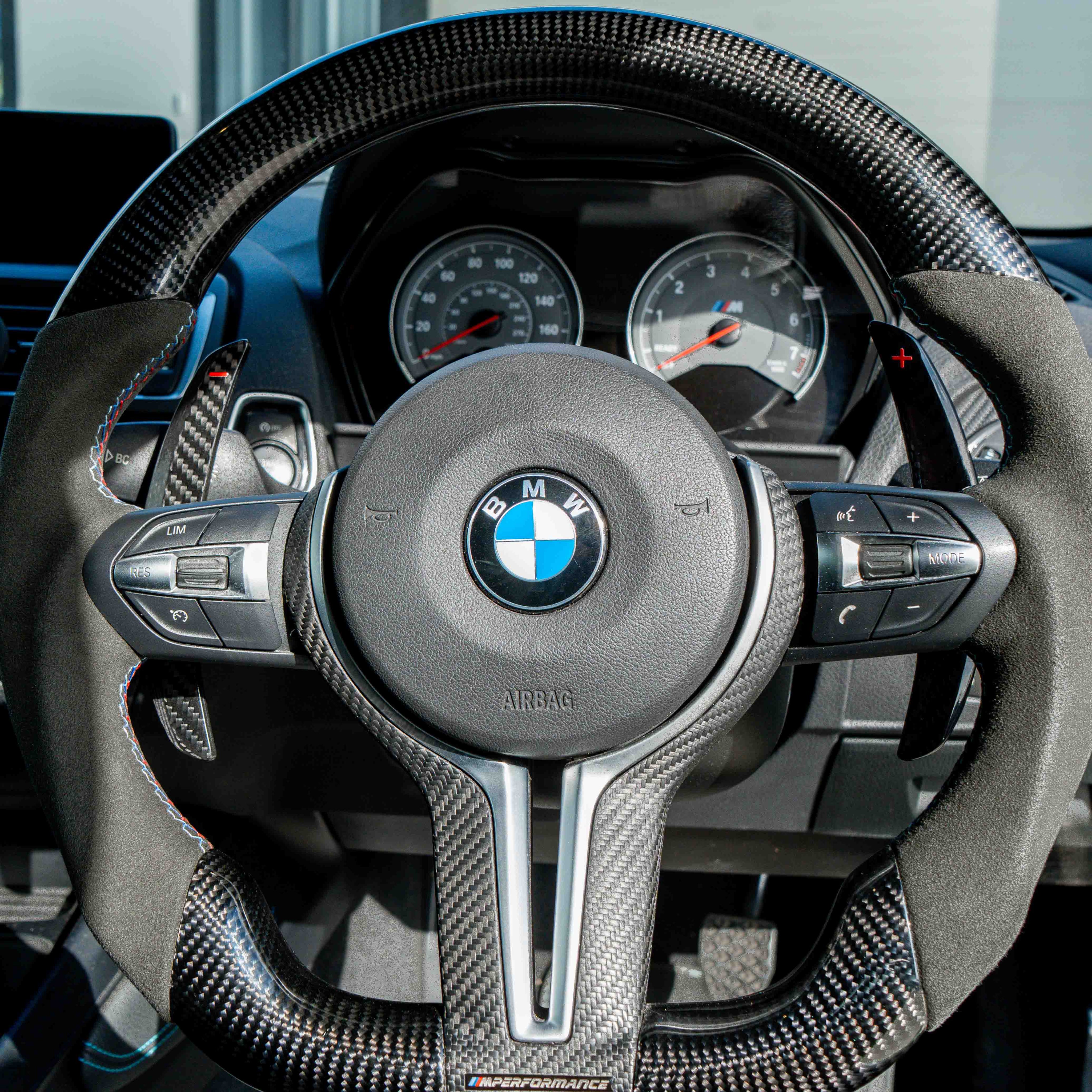 BMW CARBON FIBRE MAGNETIC SHIFTER PADDLES-Accessories-CT CARBON-CT Carbon - High-quality carbon fiber and gloss black aerodynamic parts for premium sports and luxury vehicles.