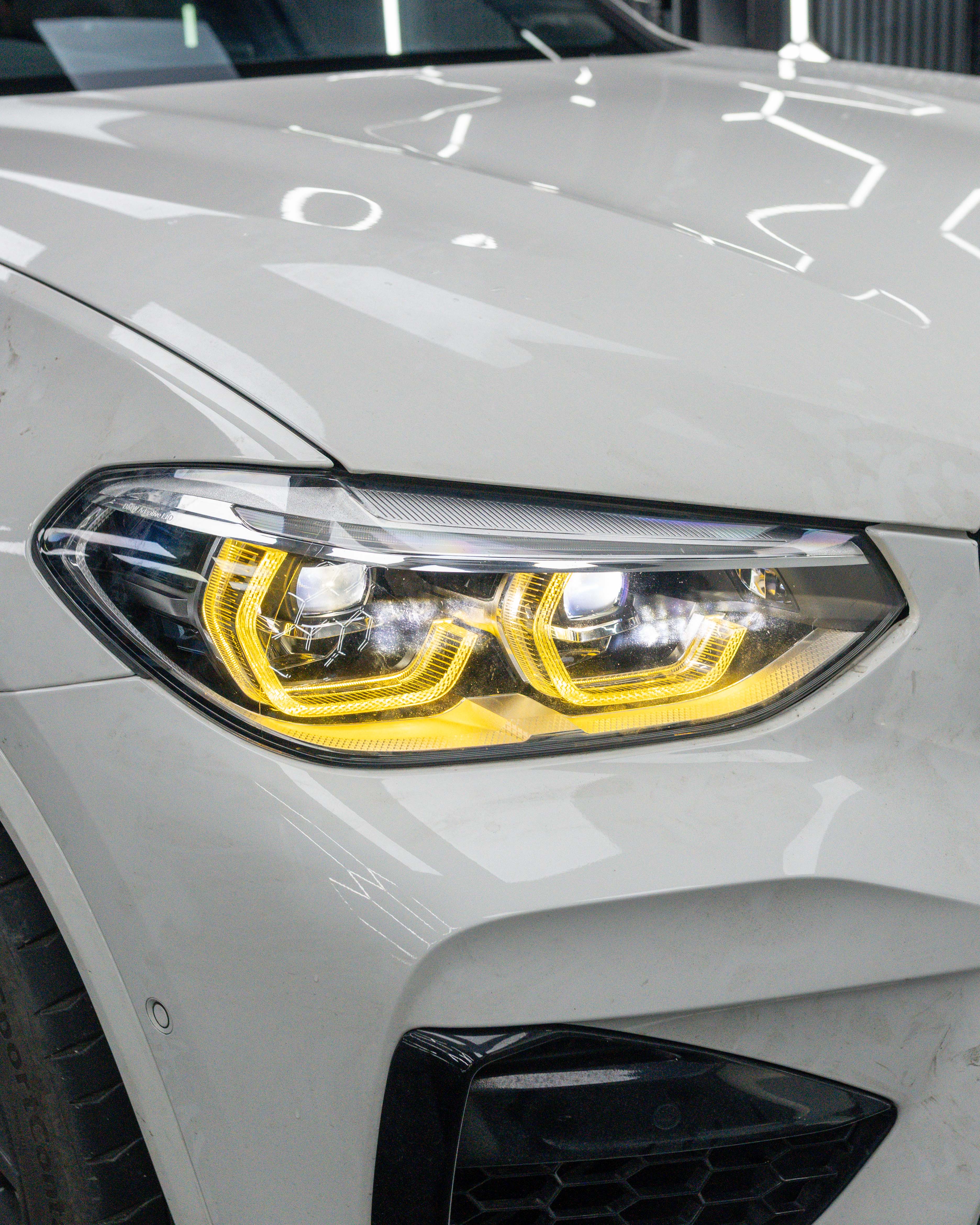 BMW F98 X4M PRE-LCI YELLOW ADAPTIVE DRL MODULE SET (2018-2021)-CT CARBON-CT Carbon - High-quality carbon fiber and gloss black aerodynamic parts for premium sports and luxury vehicles.
