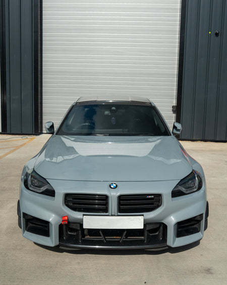 BMW G87 M2 CARBON FIBRE FRONT BUMPER CANARDS-Accessories-CT CARBON-CT Carbon - High-quality carbon fiber and gloss black aerodynamic parts for premium sports and luxury vehicles.