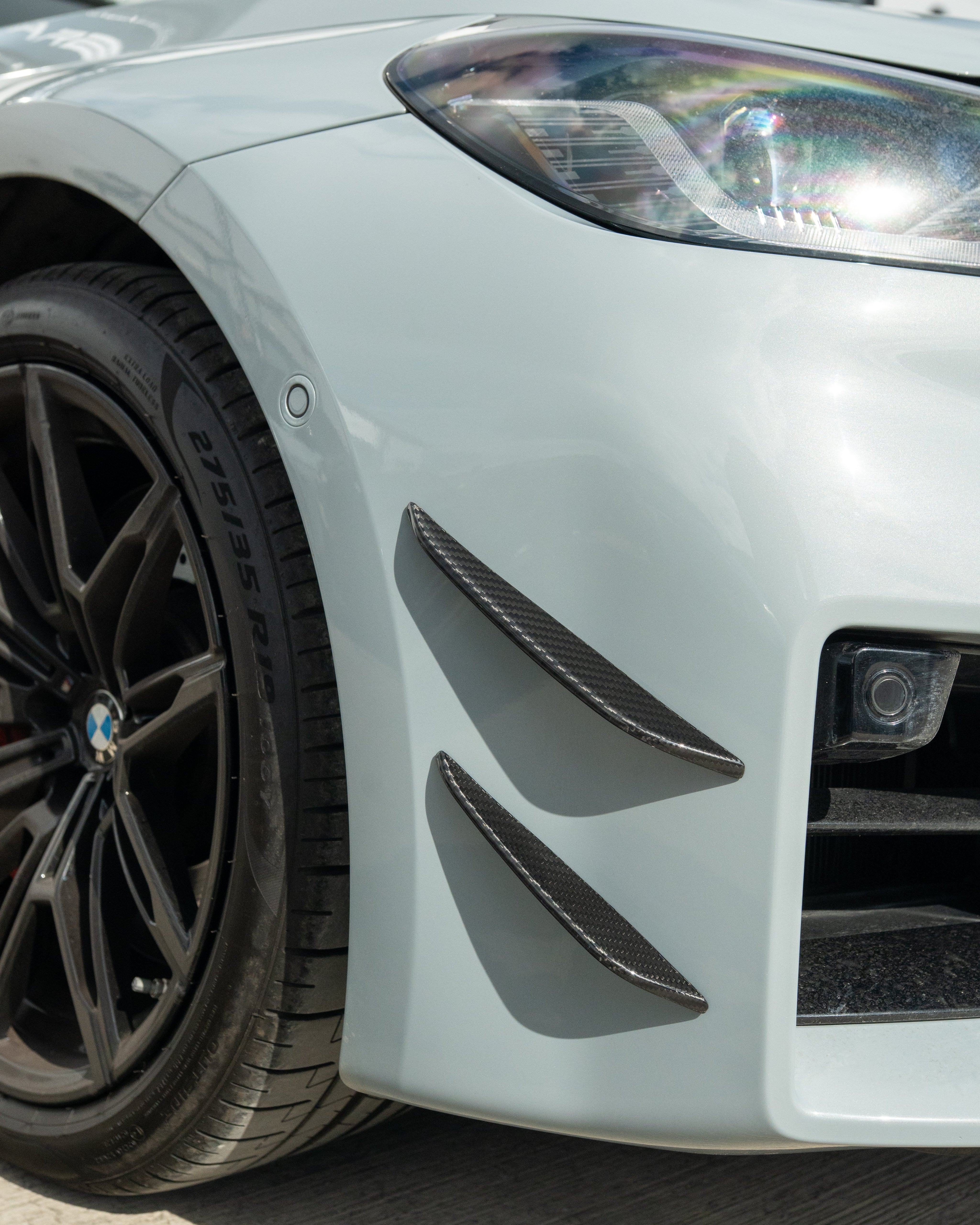 BMW G87 M2 CARBON FIBRE FRONT BUMPER CANARDS-Accessories-CT CARBON-CT Carbon - High-quality carbon fiber and gloss black aerodynamic parts for premium sports and luxury vehicles.