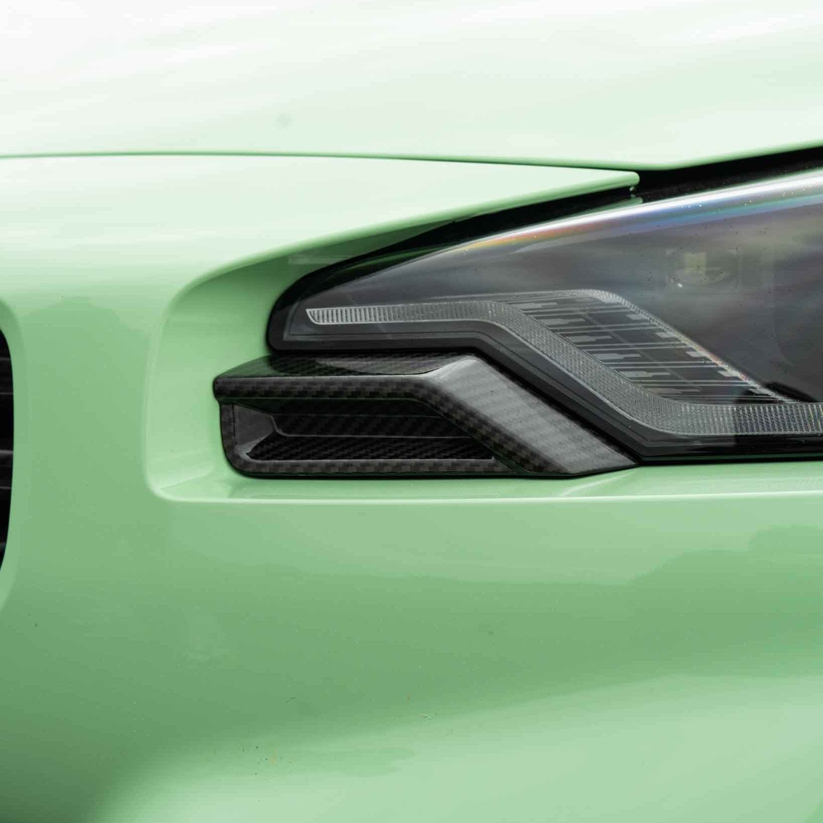 BMW G87 M2 CARBON FIBRE FRONT HEAD LIGHT ADD ON - CT DESIGN-Accessories-CT CARBON-CT Carbon - High-quality carbon fiber and gloss black aerodynamic parts for premium sports and luxury vehicles.