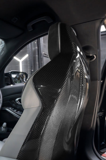BMW GXX/F9X FULL CARBON FIBRE SEATS BACKS-Accessories-CT CARBON-CT Carbon - High-quality carbon fiber and gloss black aerodynamic parts for premium sports and luxury vehicles.