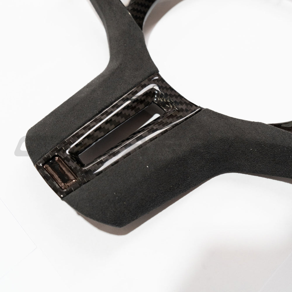 BMW Gxx M/M-SPORT CARBON FIBRE STEERING WHEEL TRIM - ACC-Accessories-CT CARBON-CT Carbon - High-quality carbon fiber and gloss black aerodynamic parts for premium sports and luxury vehicles.