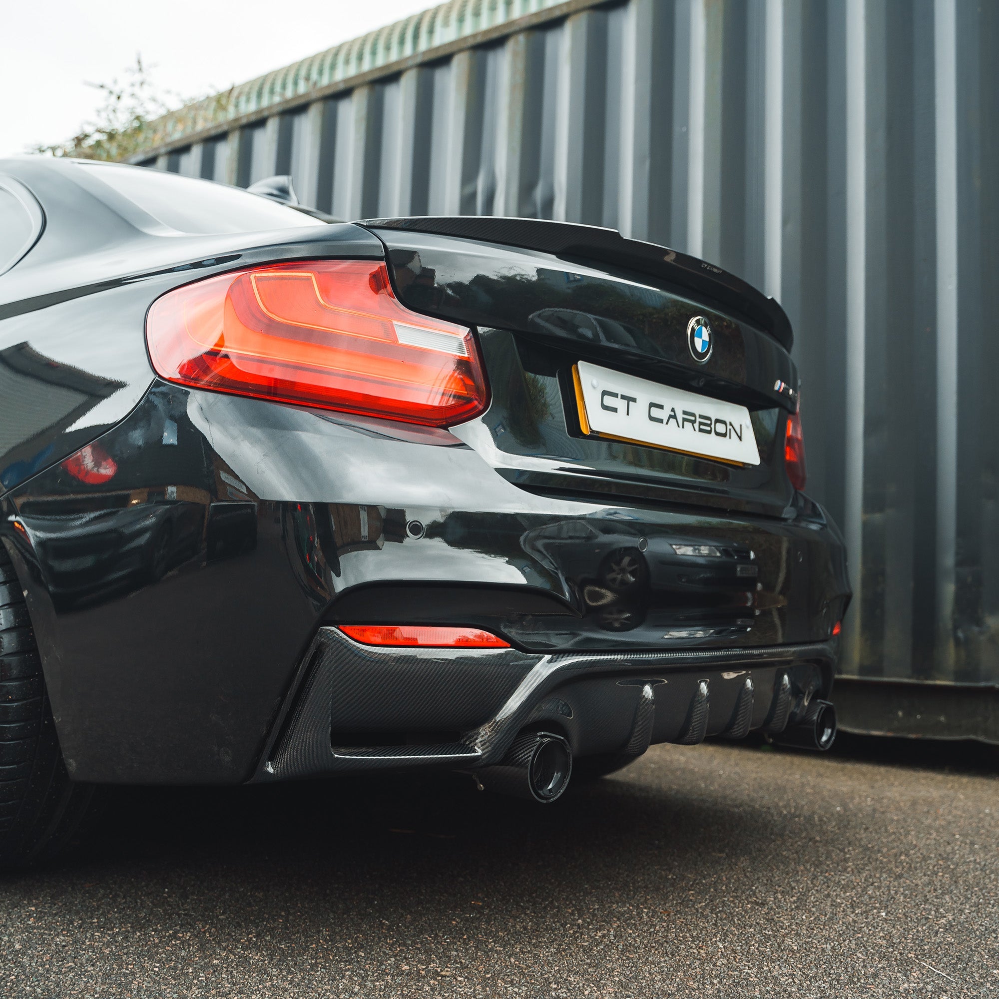BMW CARBON EXHAUST TIPS 135i/140i/235i/240i/335i/340i/435i/440i - BLACK (SET OF 2)-Exhaust Tips-CT CARBON-CT Carbon - High-quality carbon fiber and gloss black aerodynamic parts for premium sports and luxury vehicles.