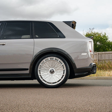 ROLLS ROYCE CULLINAN CARBON FIBRE WHEEL ARCH EXTENSIONS - CT DESIGN-Splitter-CT Carbon-CT Carbon - High-quality carbon fiber and gloss black aerodynamic parts for premium sports and luxury vehicles.