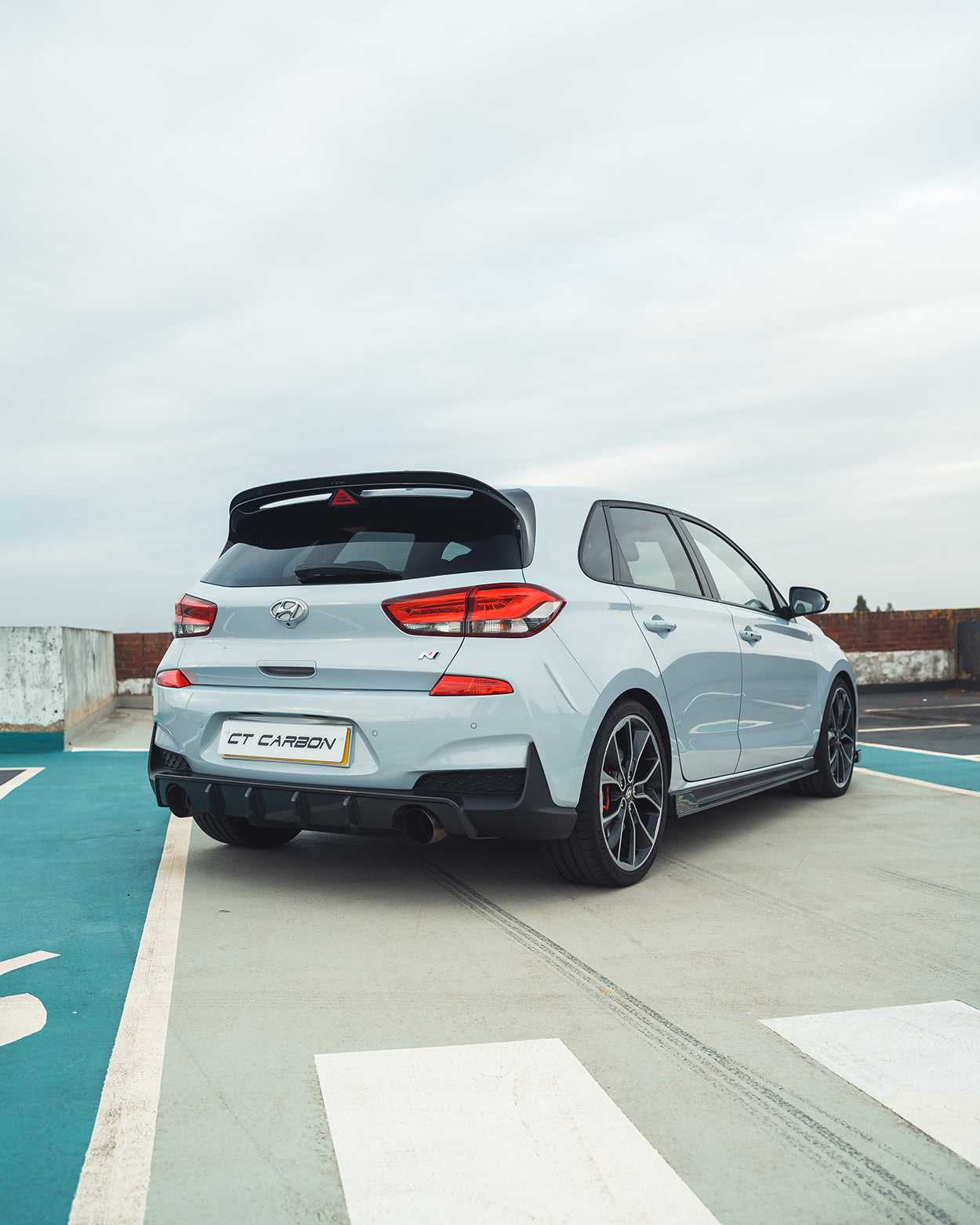 HYUNDAI i30N CARBON FIBRE DIFFUSER (PRE-FACELIFT) - CT DESIGN-Splitter-CT CARBON-CT Carbon - High-quality carbon fiber and gloss black aerodynamic parts for premium sports and luxury vehicles.