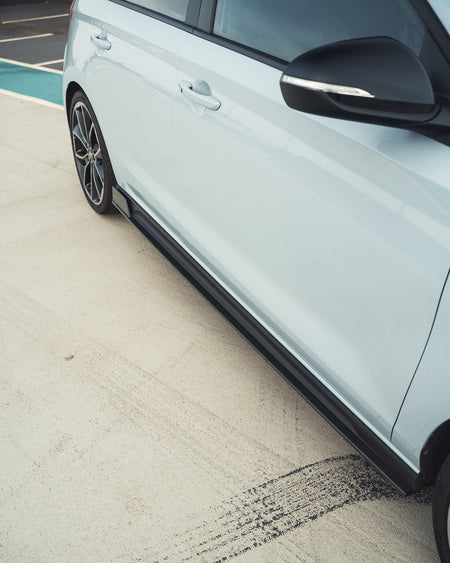 HYUNDAI i30N CARBON FIBRE SIDE SKIRTS - CT DESIGN-Side Skirts-CT CARBON-CT Carbon - High-quality carbon fiber and gloss black aerodynamic parts for premium sports and luxury vehicles.
