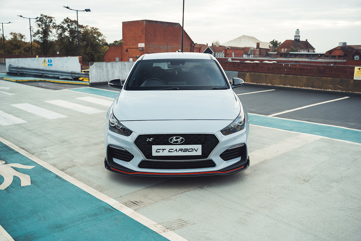 HYUNDAI i30N FRONT CARBON FIBRE SPLITTER (PRE-FACELIFT) - CT DESIGN-Splitter-CT CARBON-CT Carbon - High-quality carbon fiber and gloss black aerodynamic parts for premium sports and luxury vehicles.