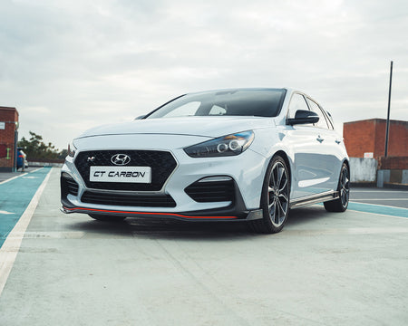 HYUNDAI i30N FRONT CARBON FIBRE SPLITTER (PRE-FACELIFT) - CT DESIGN-Splitter-CT CARBON-CT Carbon - High-quality carbon fiber and gloss black aerodynamic parts for premium sports and luxury vehicles.