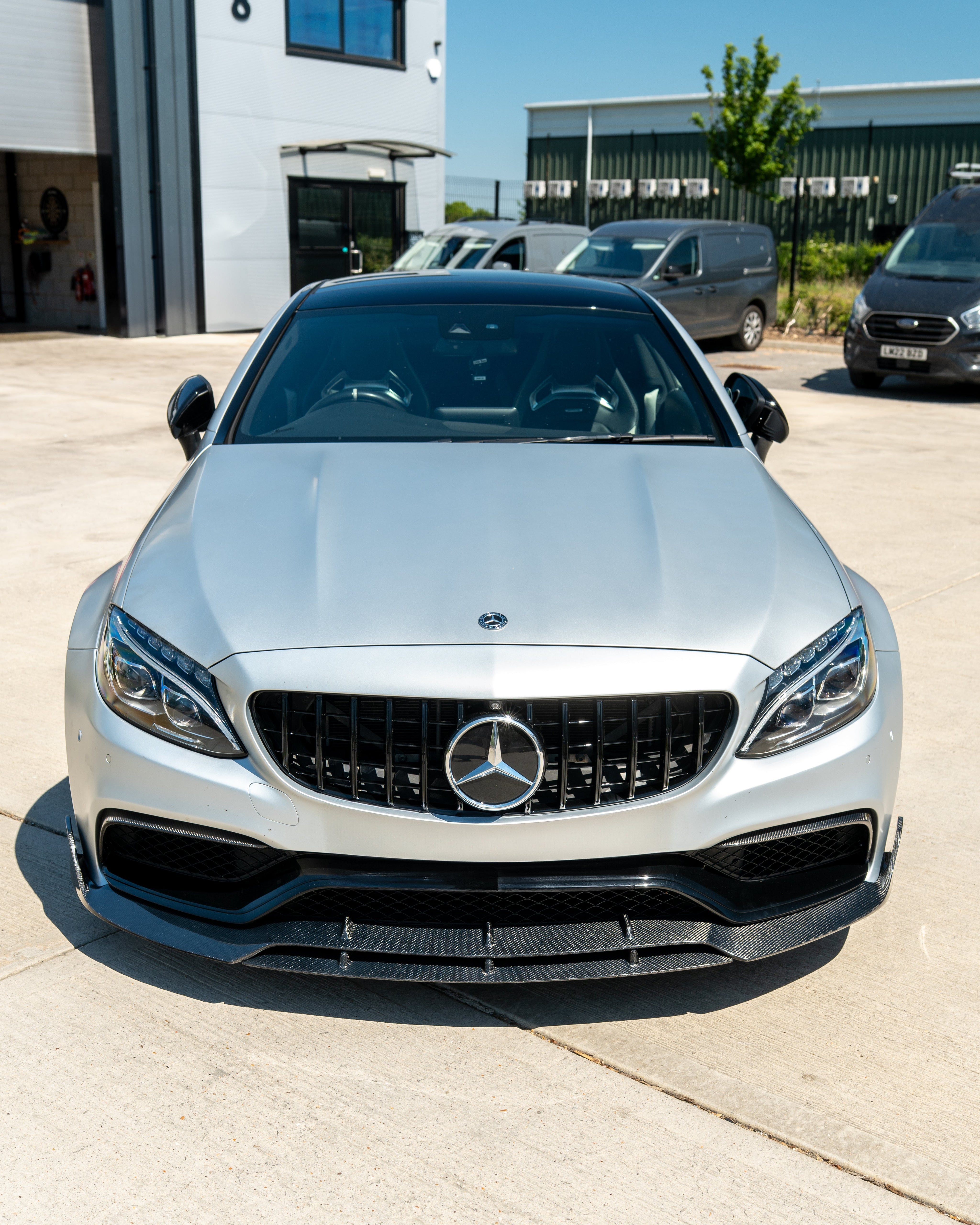 MERCEDES C63 W205 COUPE CARBON FIBRE SPLITTER - B-STYLE-Splitter-CT CARBON-CT Carbon - High-quality carbon fiber and gloss black aerodynamic parts for premium sports and luxury vehicles.