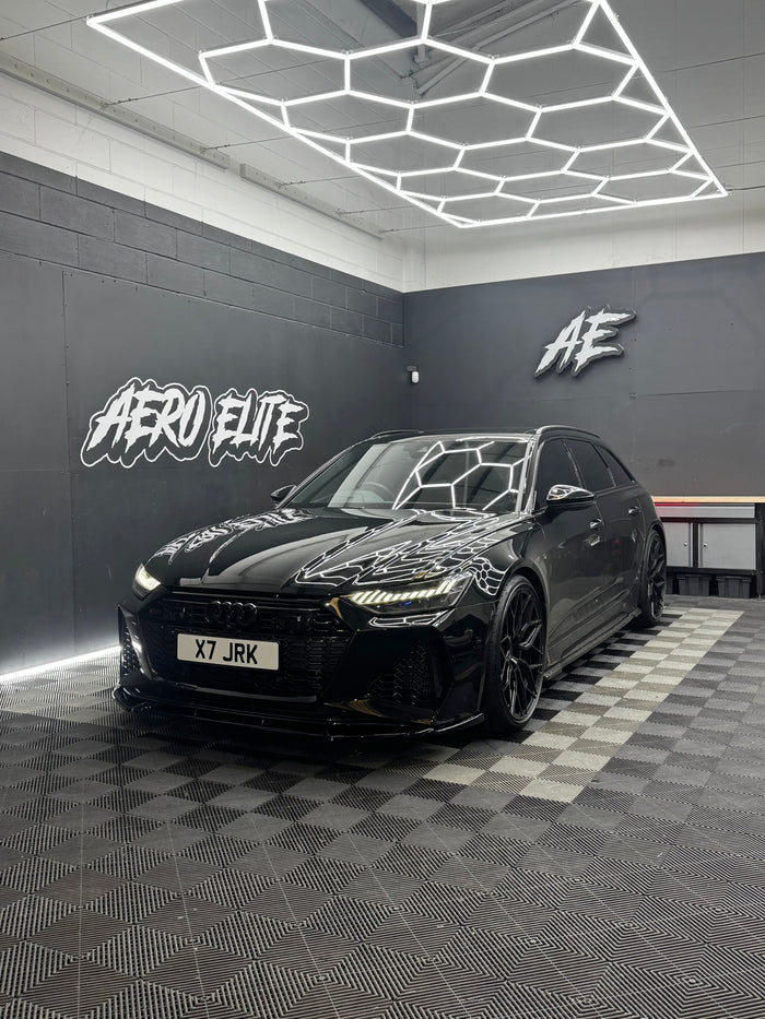 Audi RS6 C8 front three-quarter view after splitter, side skirts, rear bumper corners and diffuser, Aero Elite styling upgrade
