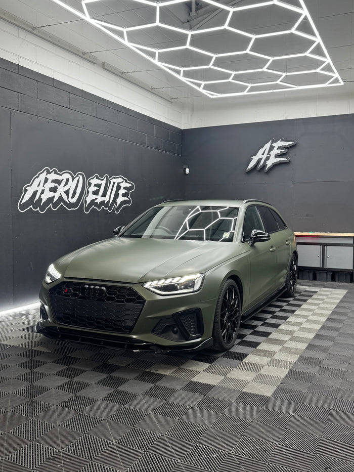 Audi S4 B9.5 front three-quarter view after full wrap, splitter, side skirts, spoiler, rear bumper corners and wheels, Aero Elite styling upgrade