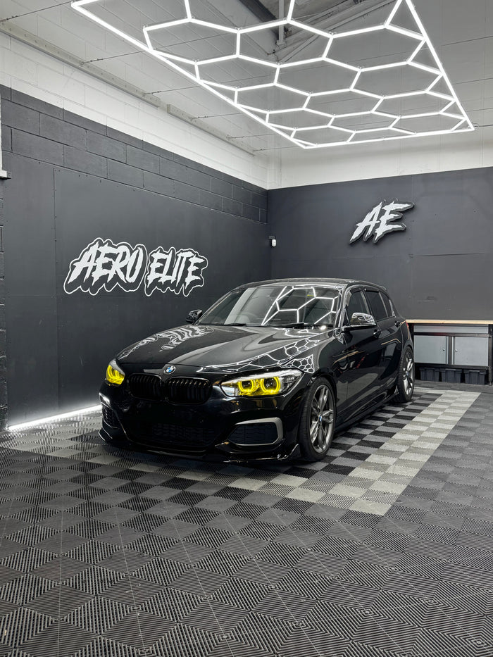 BMW 1 Series F20 front three-quarter view after splitter, side skirts, spoiler, rear bumper corners and lighting upgrade, Aero Elite styling