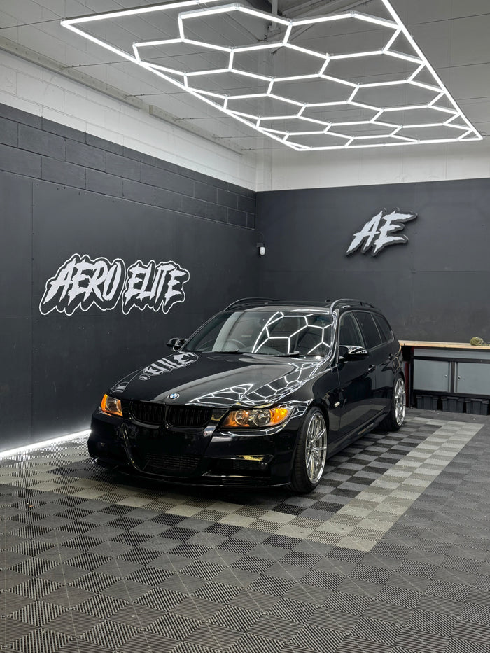 BMW 3 Series E91 front three-quarter hero shot with lowered suspension