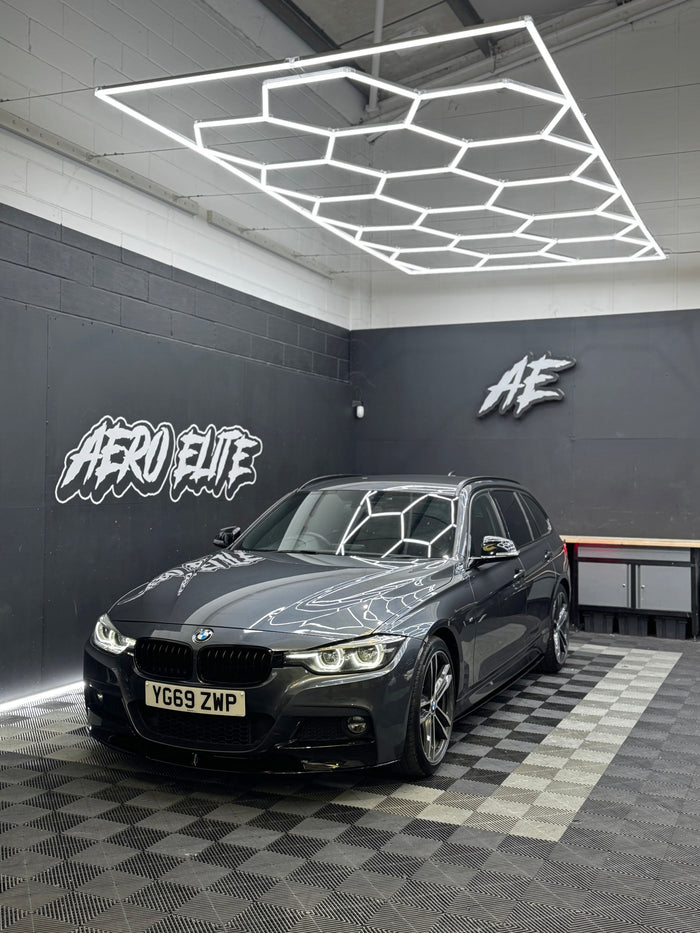 BMW 3 Series (F31) Touring after front splitter, side skirts and rear diffuser fitment, front three-quarter view