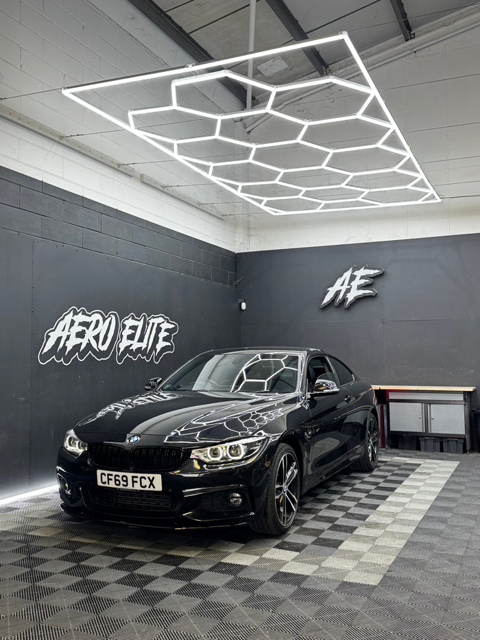 BMW 4 Series F32 front three-quarter hero shot after front splitter, boot spoiler and rear diffuser fitment