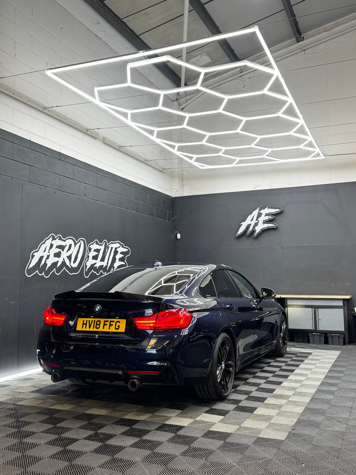 BMW 4 Series F36 Gran Coupe rear three-quarter hero shot after carbon spoiler fitment