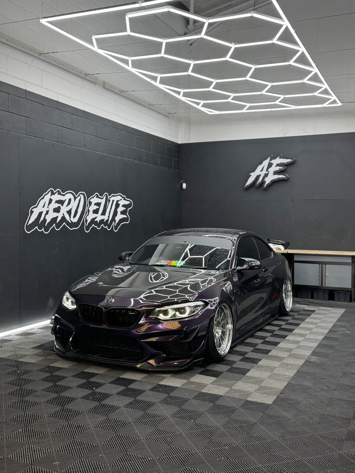 BMW M2 F87 after new split-rim alloy wheel fitment — front three-quarter view