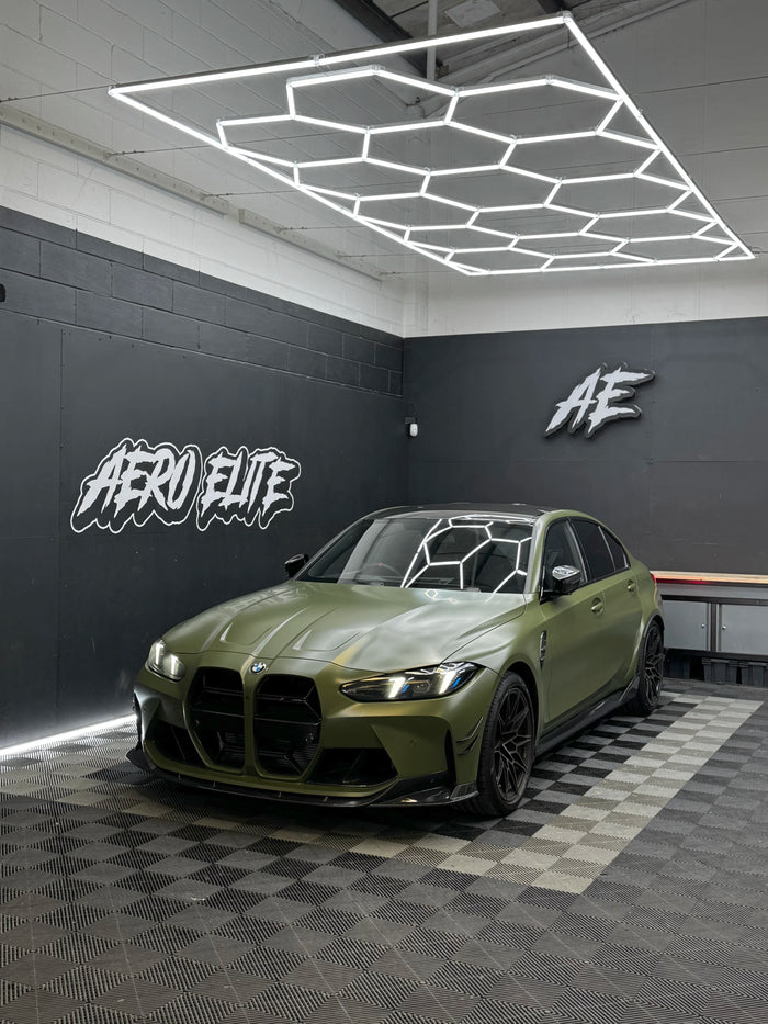BMW M3 G80 after Aero Elite full bodykit fitment — splitter, side skirts, grille, diffuser, bumper corners, canards and side vents