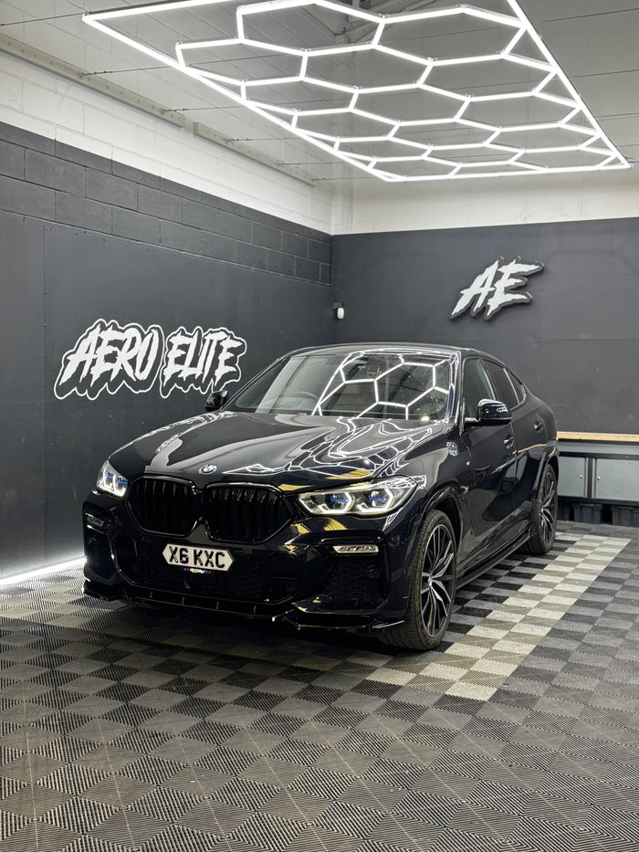 BMW X6 G06 after Aero Elite full bodykit fitment — front splitter, side skirts and rear splitter