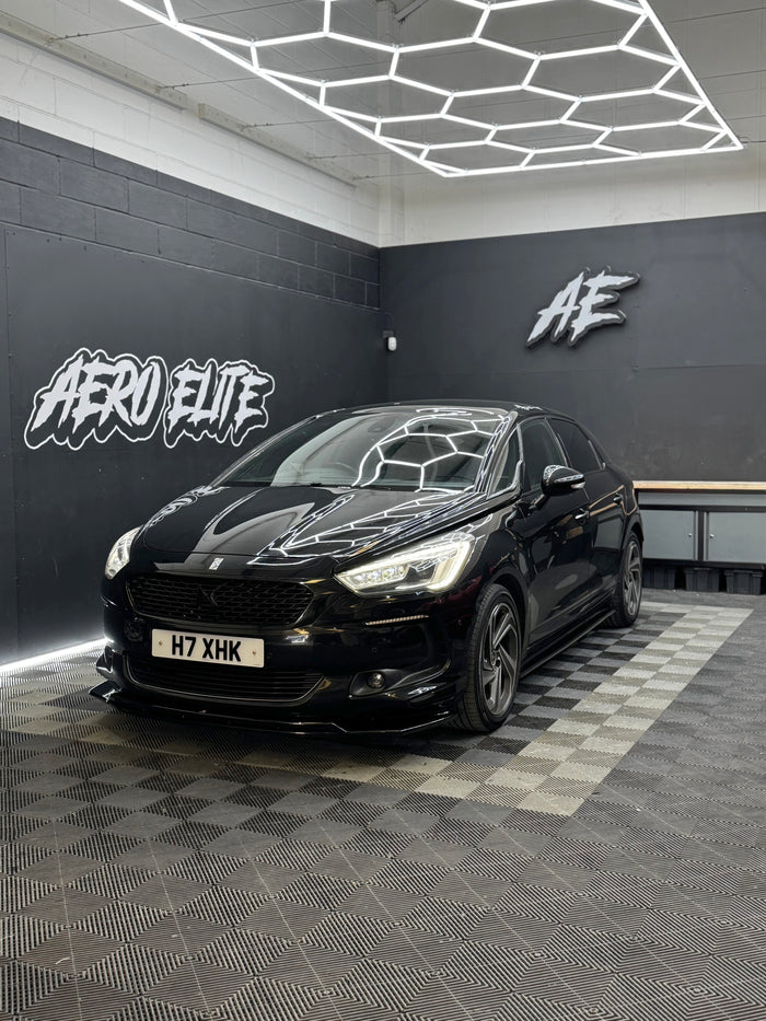 Citroen DS5 front three-quarter view after fitting a front splitter and side skirts