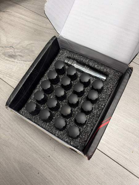 Actual in-stock set: Japan Racing JB1 black M14x1.5 wheel bolts, boxed with key