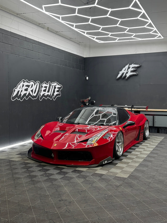 Ferrari 458 front three-quarter hero shot after wheel refurbishment and suspension setup