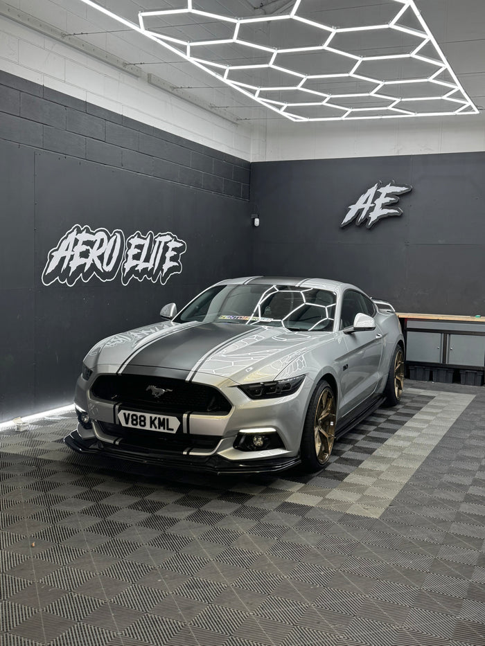 Ford Mustang GT MK6 front three-quarter hero shot after new wheel fitment