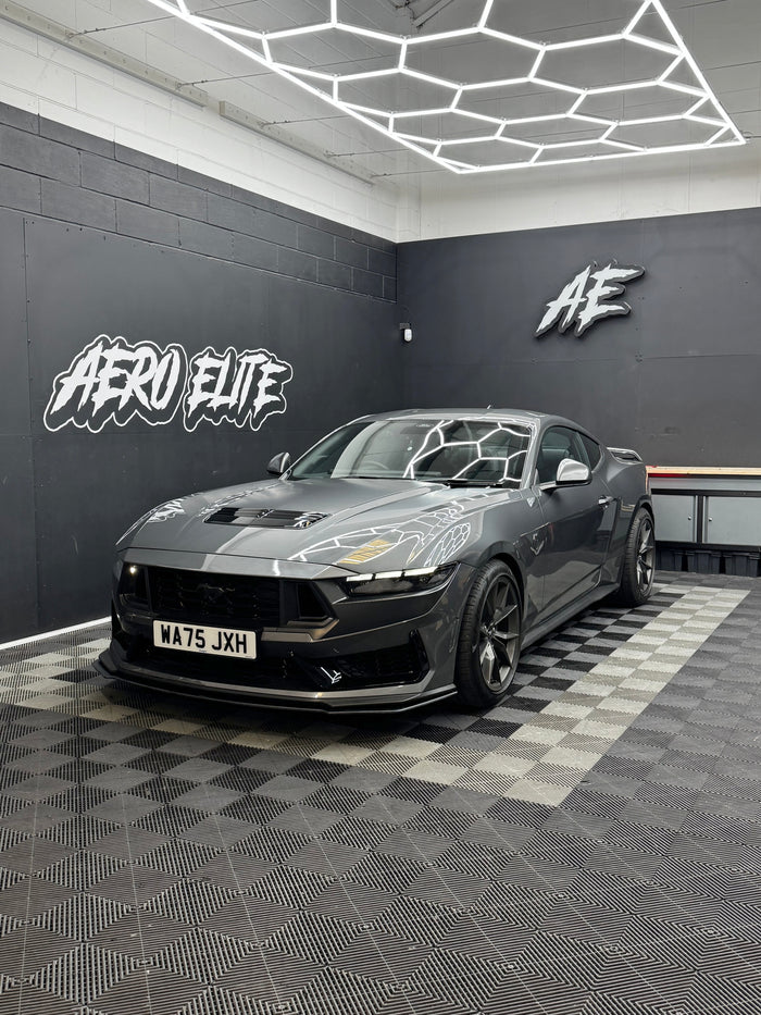 Ford Mustang Dark Horse (MK7) front three-quarter view after fitting front splitter and wheel spacers
