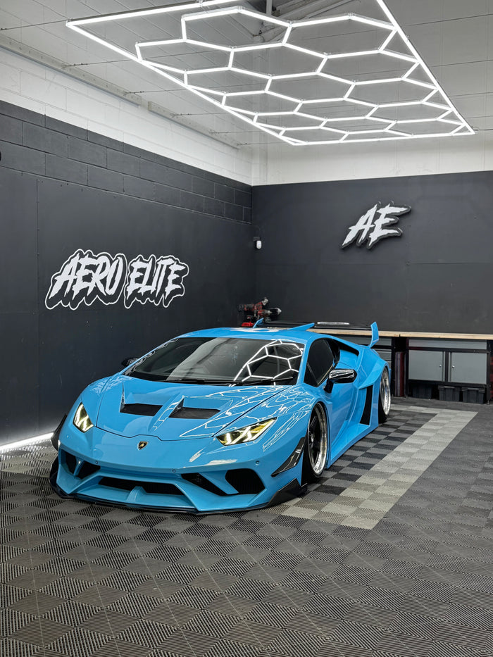 Lamborghini Huracan front three-quarter hero shot with slammed suspension