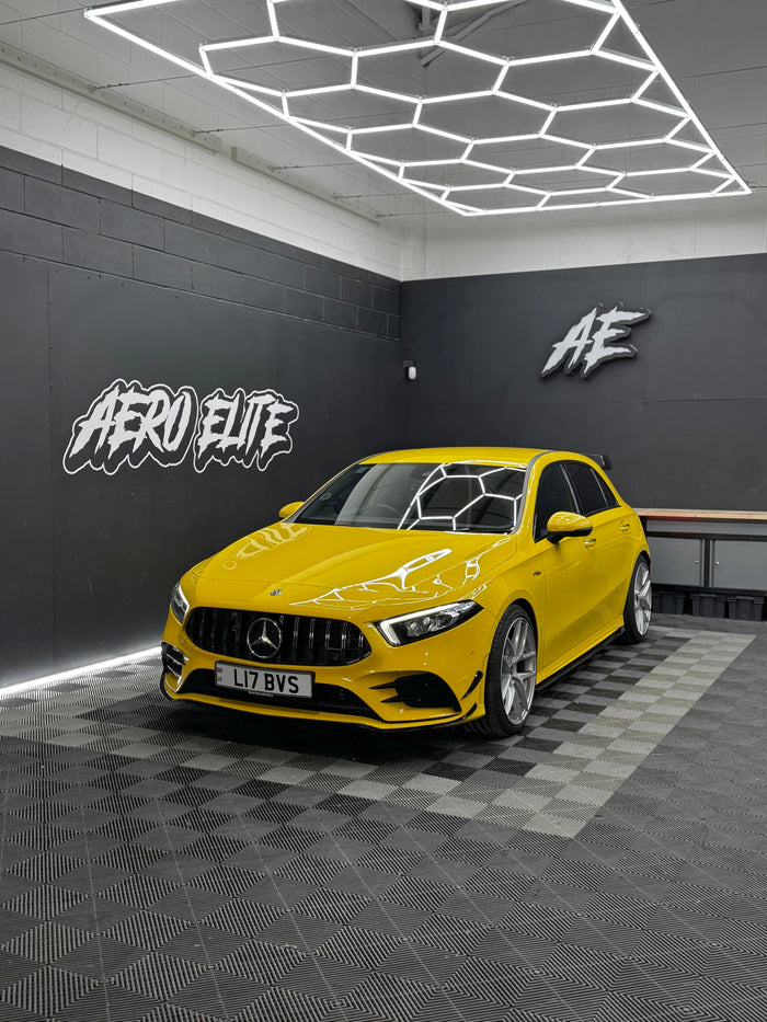 Mercedes A35 W177 front three-quarter hero shot after dechrome, splitter and spoiler fitment