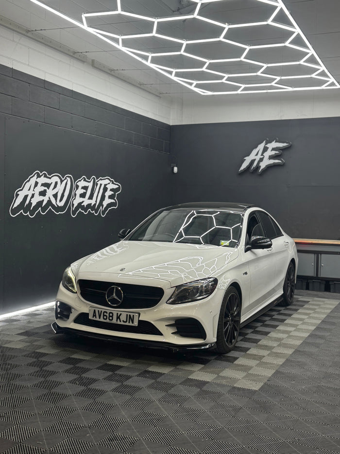 Mercedes-AMG C63 W205 front three-quarter view after fitting new front splitter, side skirts and rear diffuser