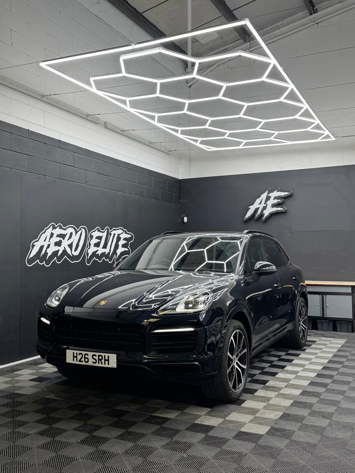 Porsche Cayenne (MK3) front three-quarter hero shot after brake caliper refinishing and exhaust upgrade, Aero Elite